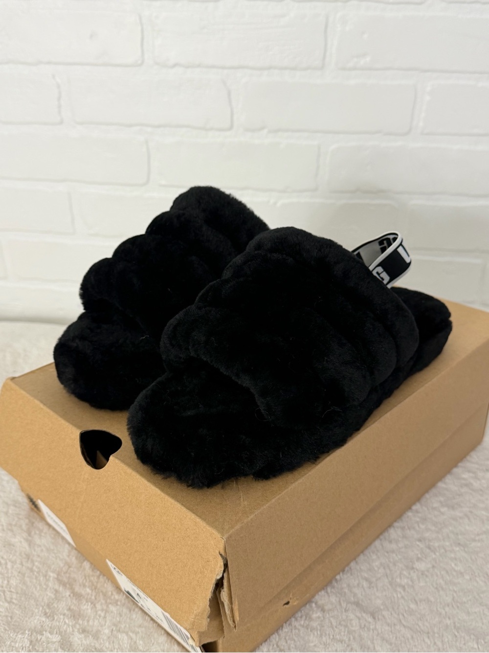 UGG Black Quilted Faux-Fur Slide Slippers with Logo Heel Strap